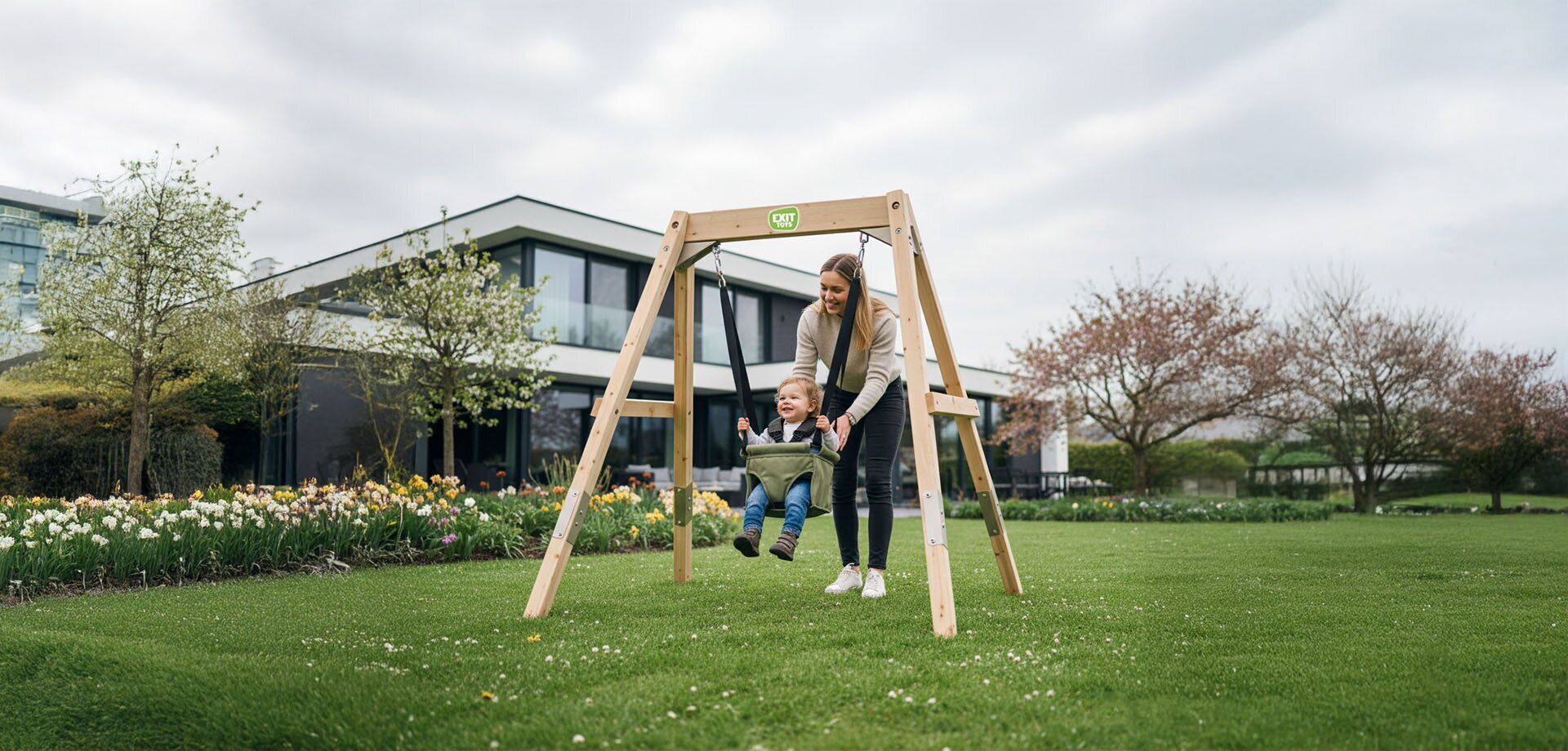 The EXIT Silvi swings are sturdy and durable wooden swings for any garden. They are available as a grow with me swing, a double swing or a wall mounted option, offering years of play fun.
